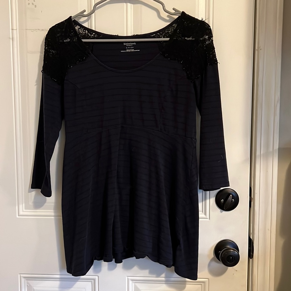 Navy blue maternity blouse with black stripes and black lace shoulders